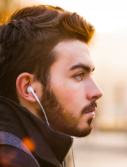 A man listening to music and thinking