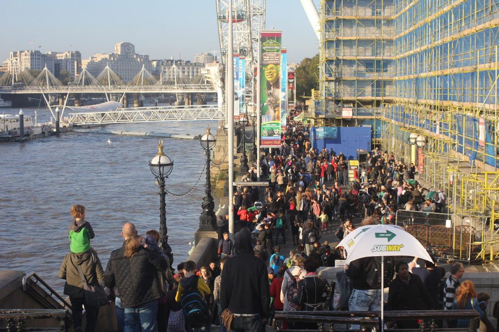 People along the Thames river during pandemic