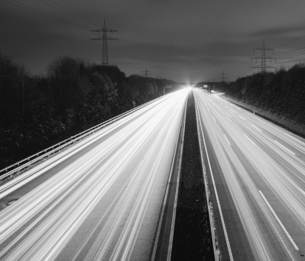 Report cover showing a motorway and headlights