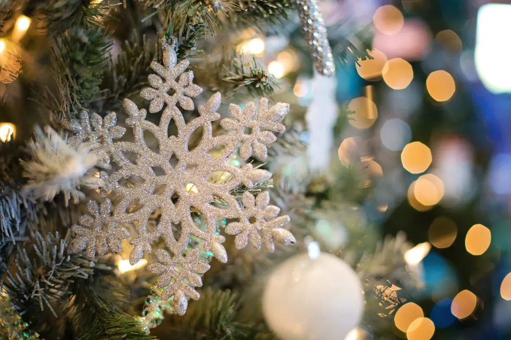 A snowflake hanged in Christmas tree