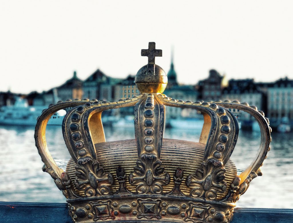 A gold crown with sea background, captured in Stockholm Sweden