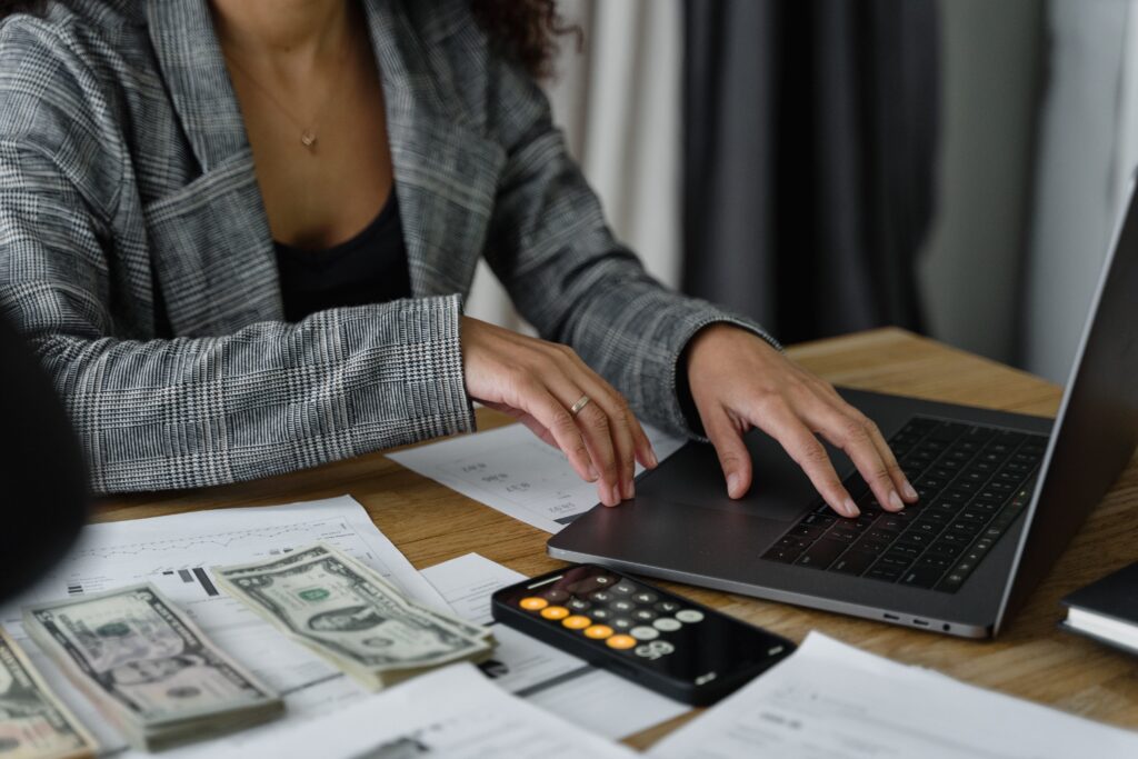 A person calculating their finances